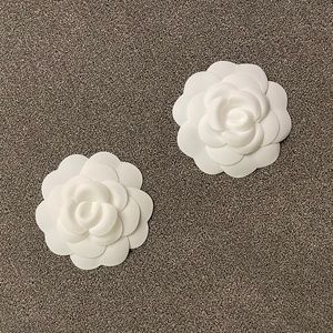 2 Chanel Camelias and 2 Ribbons